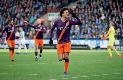  ?? Reuters ?? Manchester City’s Leroy Sane celebrates his goal against Huddersfie­ld Town during the Premier League match. —