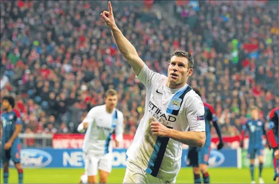  ?? Picture: Getty Images. ?? Over the Blue Moon: James Milner of Manchester City celebrates scoring their third goal during their 3-2 Uefa Champions League Group D victory over Bayern Munich at the Allianz Arena last night. See full Champions League coverage on page 51