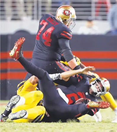  ?? Scott Strazzante / The Chronicle ?? Brian Hoyer is sacked on 4th-and-20 in fourth quarter, ending the 49ers’ late rally against the Rams.