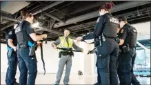  ??  ?? Delta Police officers received training in October 2018 on applying tourniquet­s.