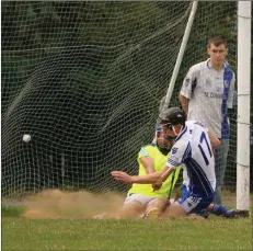  ??  ?? Oliver Doran scoring a goal for Craanford in their narrow defeat to Oylegate-Glenbrien in St. Patrick’s Park on Saturday.