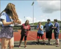  ?? BEN LAMBERT / HEARST CONNECTICU­T MEDIA ?? Torrington High School welcomed incoming freshman Friday with games and pizza.