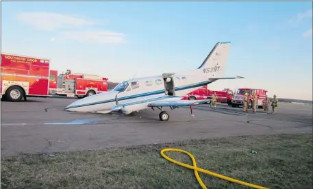  ?? Door County Sheriff’s Department via Reuters ?? A twin-engine Cessna sits at Cherryland Airport near Sturgeon Bay, Wisconsin, on Monday. Helen Collins, an 80-year-old woman with no flying experience took over the controls after her pilot husband John’s fatal collapse, landing their twin-engine plane...