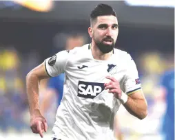  ?? (Reuters) ?? ISRAELI STRIKER Munas Dabbur has settled into his role with Bundesliga club Hoffenheim and is a key factor in the blue-and-white’s World Cup qualifying campaign.