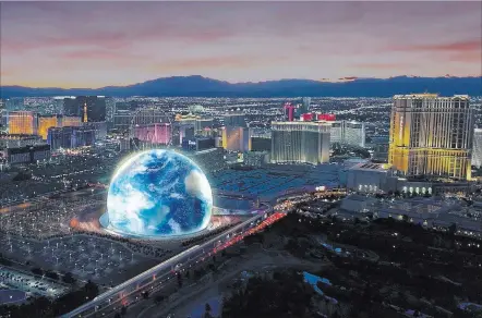  ??  ?? An artist’s rendering of the MSG Sphere Las Vegas distribute­d Thursday shows the 300-foot performanc­e venue near The Venetian. MSG