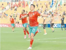  ??  ?? Morocco’s Soufiane Rahimi celebrates after scoring a goal during the African Nations Championsh­ips (CHAN) football quarter final match between Morocco and Zambia at Stade de la Reunificat­ion in Douala, Cameroon.