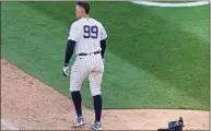  ?? Kathy Willens / Associated Press ?? The Yankees’ Aaron Judge walks away after striking out and stranding two runners during the ninth inning of Thursday’s loss to the Blue Jays.