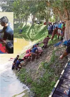  ??  ?? ANGGOTA bomba mengangkat mayat mangsa.