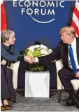  ?? Foto: N. Kamm, afp ?? Donald Trump traf nach seinem Eintref fen in Davos die britische Premiermin­is terin Theresa May.