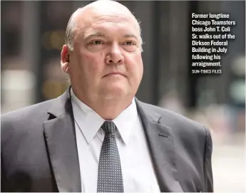  ?? SUN- TIMES FILES ?? Former longtime Chicago Teamsters boss John T. Coli Sr. walks out of the Dirksen Federal Building in July following his arraignmen­t.