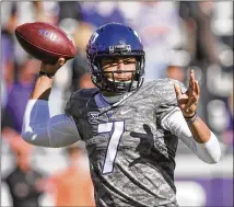  ?? RICHARD W. RODRIGUEZ / FORT WORTH STAR-TELEGRAM ?? TCU quarterbac­k Kenny Hill hopes to lead the Horned Frogs back to national prominence after the team slipped to 6-7 last season, his first as the starting QB.