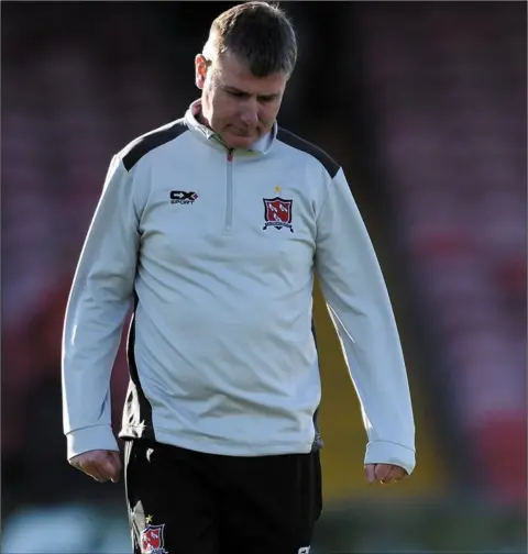  ?? Colin Bell/pressphoto­s.ie ?? A dejected Stephen Kenny leaves the Turner’s Cross pitch on Saturday.