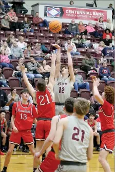  ?? Mark Ross/Special to the Herald-Leader ?? Siloam Springs senior Jaxson Spence shoots over Russellvil­le’s Caleb Campbell during Friday’s game at Panther Activity Center. The Cyclones defeated the Panthers 47-42.