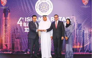  ??  ?? Dubai Islamic Bank was recognised for its outstandin­g performanc­e among the world’s Islamic retail banks, taking home ‘Strongest Islamic Retail Bank in the world’, along with the ‘Critics’ Choice for Most Innovative Digital Retail Bank’ award.