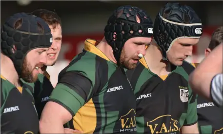  ??  ?? The Mallow front row takes a breather in their J-League Division 2 game against Thurles