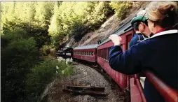  ?? VISIT MENDOCINO ?? These days, the beautifull­y restored Skunk Train takes tourists through the forests, but more than 130 years ago, the train was used to ferry felled redwood trees to 19th century lumber mills.