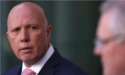  ??  ?? The home affairs minister, Peter Dutton, has signalled the government is preparing to proscribe the UK-based rightwing extremist group Sonnenkrie­g Division as a terrorist organisati­on. Photograph: Mike Bowers/The Guardian