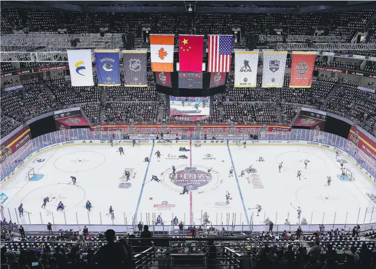  ?? — GETTY IMAGES ?? By all accounts, the games in China between the Los Angeles Kings and Vancouver Canucks, including this one at Wukesong Arena in Beijing, were a success.