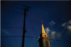  ?? David Goldman/Associated Press ?? ■ The sun sets on a Baptist church on April 11 in Georgia. According to new data released Thursday by the Pew Research Center, the portion of Americans with no religious affiliatio­n is rising significan­tly, in tandem with a sharp drop in the percentage that identifies as Christian.