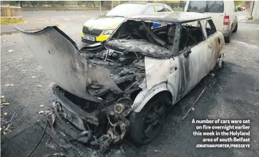  ?? JONATHAN PORTER/PRESSEYE ?? A number of cars were set
on fire overnight earlier this week in the Holyland
area of south Belfast