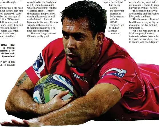  ?? PHOTO: CHRIS HYDE/GETTY IMAGES ?? TRY TIME: Rod Davies in typical pose scoring a try during his time with the Queensland Reds.