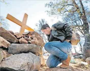  ?? Luis Cortes El Universal via Associated Press ?? THE GRAVE of environmen­tal activist Isidro Baldenegro Lopez. In the early 2000s, he gained fame by organizing sit-ins and marches and a human blockade to halt logging operations in the Sierra Tarahumara.