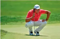  ?? AFP ?? Jhonattan Vegas lines up a putt on the second hole during the final round of the RBC Canadian Open. —