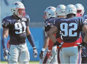  ?? STAFF PHOTO BY MATT STONE ?? LOOKING GOOD: Rookie defensive lineman Deatrich Wise has managed to stand out from the crowd in training camp.