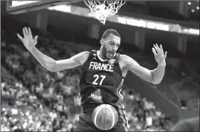  ?? AP/Ng Han Guan ?? France’s Rudy Gobert dunks during a quarterfin­al match against United States for the FIBA Basketball World Cup in Dongguan in southern China’s Guangdong province on Wednesday.