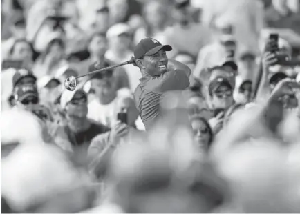  ??  ?? Tiger Woods, hitting a tee shot during the final round of the Valspar Championsh­ip in Palm Harbor, Fla., closed with a 1-underpar 70 and finished one shot behind Paul Casey, the champion. Casey closed with a 6-under 65.