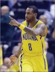  ?? MICHAEL CONROY — THE ASSOCIATED PRESS FILE ?? In this file photo, Indiana Pacers’ Rasual Butler gestures during the NBA basketball Eastern Conference finals against the Miami Heat in Indianapol­is. Authoritie­s say Butler and his wife Leah LaBelle, whose given name is Leah LaBelle Vladowski, died in...