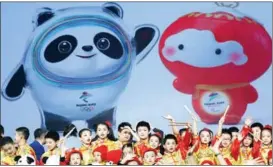  ?? ZOU HONG / CHINA DAILY ?? China unveils the official mascots — Bing Dwen Dwen and Shuey Rhon Rhon — for the Games on Sept 17, 2019.