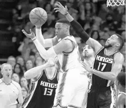  ?? SUE OGROCKI/ASSOCIATED PRESS ?? Russell Westbrook, front, fell just short of a triple-double as Oklahoma City won its fifth consecutiv­e game Saturday. He had 28 points, 8 rebounds and 10 assists.