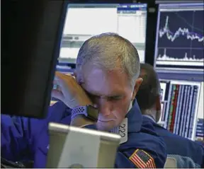  ??  ?? Wall Street a enregistré une forte dégringola­de lors de la séance de lundi.