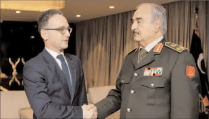  ?? -REUTERS ?? German Foreign Minister Heiko Maas shakes hands with Libya's commander Khalifa Haftar, in Benghazi, Libya.