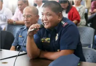  ?? Photo by Milo Brioso ?? STILL THE CHIEF. Baguio Cit Police Office city director Senior Supt. Ramil Saculles were conferred will remain the city’s top cop following the affirmatio­n by a nine man panel led by Baguio City mayor Mauricio Domogan.