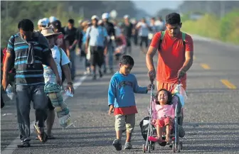  ?? GETTY IMAGES ?? RALLYING CRY: President Trump is seeking support ahead of midterm elections Tuesday for his still forthcomin­g plan that would limit the ability of migrants to seek asylum as thousands of Central Americans make their way toward the U.S. border.