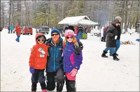  ?? File photo ?? Brian Talon, of Southingto­n, attends an ice-sculpting workshop with his daughters, Emma and Lily, at the 2015 “No Child Left Inside” winter festival at Burr Pond State Park in Torrington.