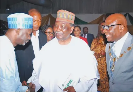  ??  ?? Gombe State Governor, Ibrahim Dankwanbo (left); former Head of State, General Yakubu Gowon (rtd), President Chartered Institute of Bankers of Nigeria (CIBN), Dr. Uche Olowu during the CIBN Extraordin­ary Fellowship Investitur­e in Lagos PHOTO: AYODELE ADENIRAN