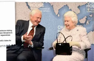  ??  ?? Carrying on: Queen and Sir David Attenborou­gh at Chatham House in London last night