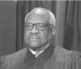  ?? J. SCOTT APPLEWHITE/AP FILE ?? Justice Clarence Thomas was in his third year on the Supreme Court when he paid off the last of his law school debt.