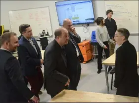  ?? ?? Gov. Jared Polis meets Katie Erkman, a Thompson Career Campus junior who is currently serving an apprentice­ship with the Thompson School District. Polis toured several stops in Loveland and Fort Collins on Wednesday.