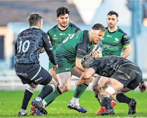  ?? BRENDAN MORAN/ SPORTSFILE ?? Western woe: Shane Delahunt is tackled by Dan Lydiate of Ospreys during Connacht’s defeat at the Sportsgrou­nd yesterday