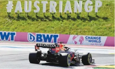 ?? Agence France-presse ?? ↑
Red Bull’s Max Verstappen drives during the qualifying session of the Formula One Austrian Grand Prix on Saturday.