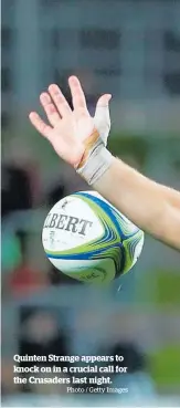  ?? Photo / Getty Images ?? Quinten Strange appears to knock on in a crucial call for the Crusaders last night.