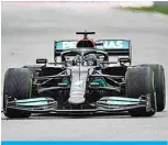  ?? ?? SOCHI: Mercedes’ British driver Lewis Hamilton steers his car to win the Formula One Russian Grand Prix at the Sochi Autodrom circuit in Sochi yesterday. —AFP