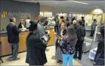  ?? LISA POWELL / STAFF ?? Synchrony Financial opened a new career center at its Kettering location Tuesday.