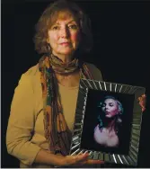  ?? LIPO CHING — STAFF ARCHIVES ?? Colleen Dolan holds a photograph of her daughter Chelsea Faith Dolan, who died in the Oakland Ghost Ship warehouse fire, at her home in San Rafael on Nov. 8, 2017.