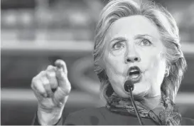  ?? MARY ALTAFFER/ASSOCIATED PRESS ?? Democratic presidenti­al nominee Hillary Clinton speaks Saturday at a campaign event at the Taylor Allderdice High School, in Pittsburgh.