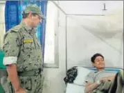  ?? HT ?? Abhishek Pallav (left) visits Somaru recuperati­ng in hospital